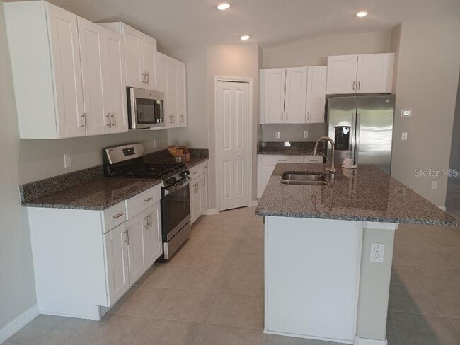 Building Photo - 5428 Amaryllis Garden St