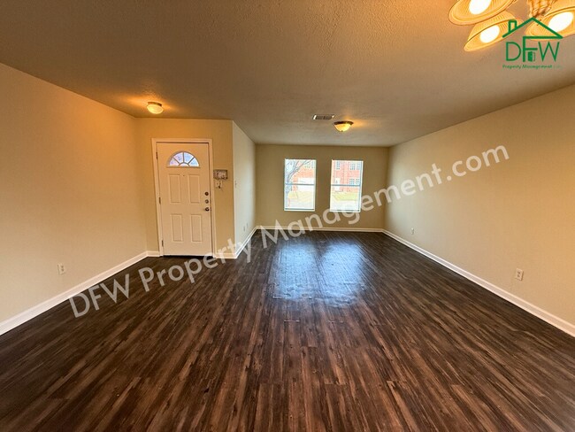 Photo - Spacious 5-Bedroom Home for Lease with Fireplace & 2-Car Garage in Mesquite!