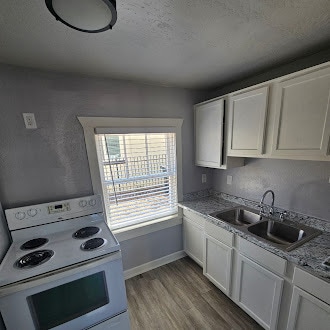 201-3 Kitchen - 16th Ave Apartments