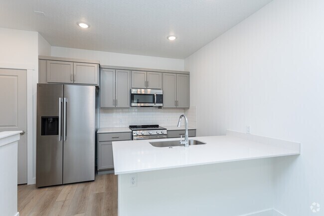 1 habitación, 1,5 baños - 775 pies cuadrados - Cocina - Innovation Park at Holbrook Farms