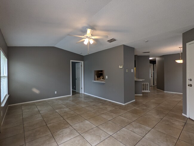 Living Room to Master Bedroom and Kitchen with pass-through Breakfast Bar - 2543 Corian Glen Dr