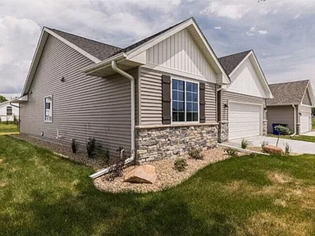 Building Photo - NE Newer Home, 3 Bedroom 2 bath, Attached ...