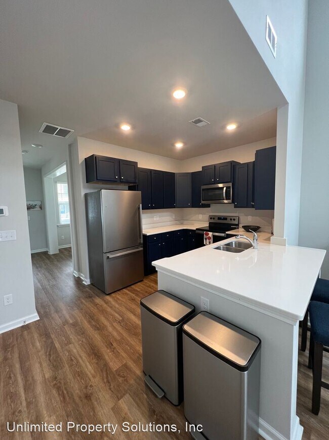 Building Photo - 3 br, 2.5 bath House - 4628 Wildaire Lane