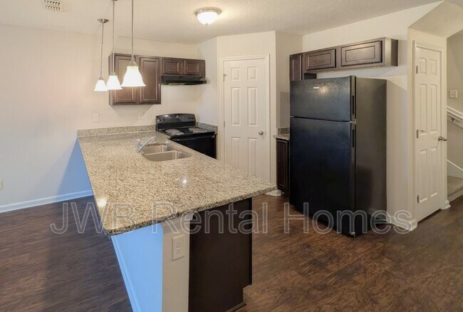 Foto del edificio - 8401 McGirts Village Ln