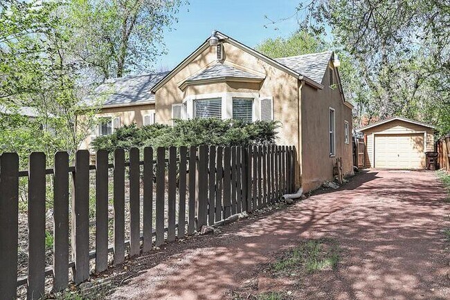 Building Photo - Well-Maintained Cottage with Private Yard ...