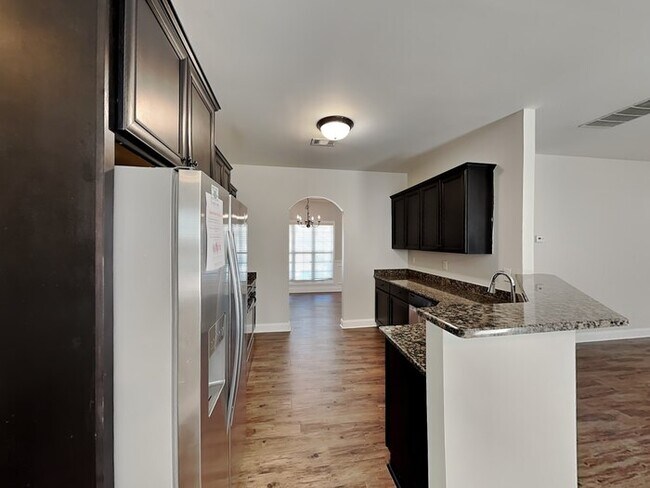 Building Photo - Sign & Save with One Month FREE Rent!