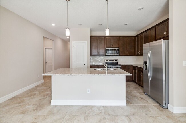 Building Photo - Beautiful New Energy Efficient 4/2 Close t...