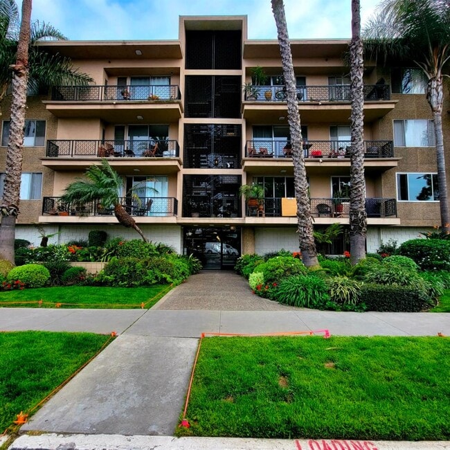 Exterior Front facing 2nd St. with security entry into lobby - 2662 E 2nd St Apartment