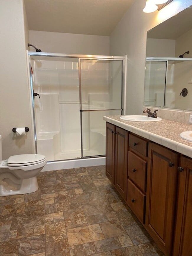 Building Photo - Hellgate Elementary School Area - 3 Bed, 2 Bath, Garage and a Fenced Yard