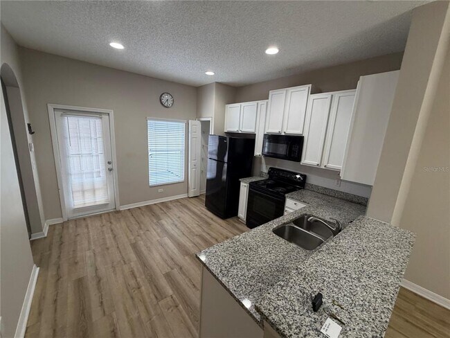 Foto del edificio - 6486 Merrick Landing Blvd