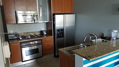 Building Photo - 9055 SW 73rd Ct