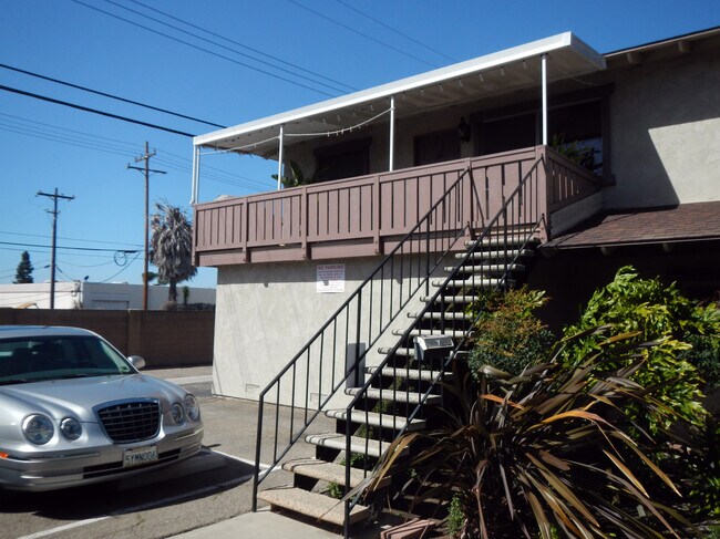 Stairs to Private 2 Bedroom and 1 Bath Home with Garage Parking and Inside Washer and Dryer - 16171 Ganges Lane #4, Huntington Beach CA 92647