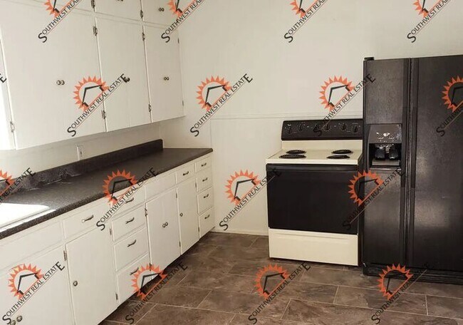Building Photo - 3 bed 2 bath - Portales