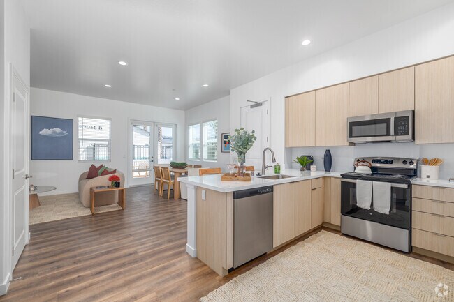 3 habitaciones, 3 baños - 1356 pies cuadrados - Cocina - Desert Meadows Townhomes