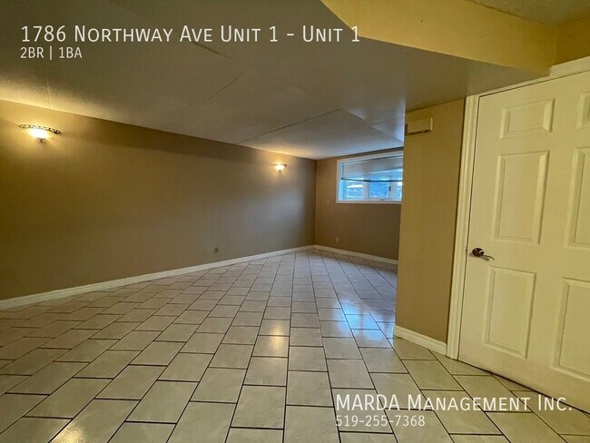 Building Photo - SPACIOUS 2 BED/1 BATH MODERN LOWER LEVEL SUITE! +HYDRO, GAS & WATER!