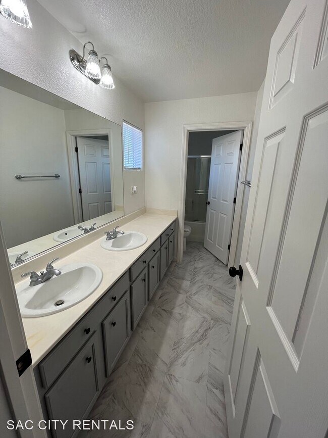 Building Photo - 4 br, 2.5 bath House - 10040 Wild Orchid Way