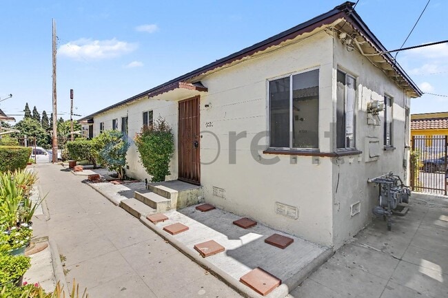 Building Photo - 7027 Holmes Ave