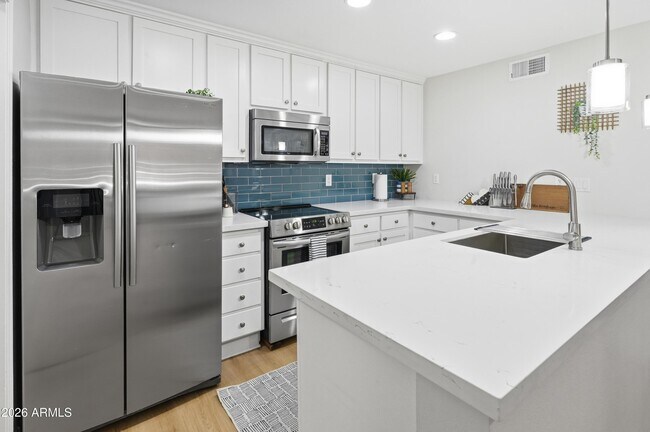 Foto del edificio - 4704 E Paradise Village Pkwy N