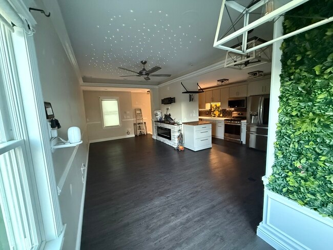 Living Room with Fire Place Heater - 99 Roland St