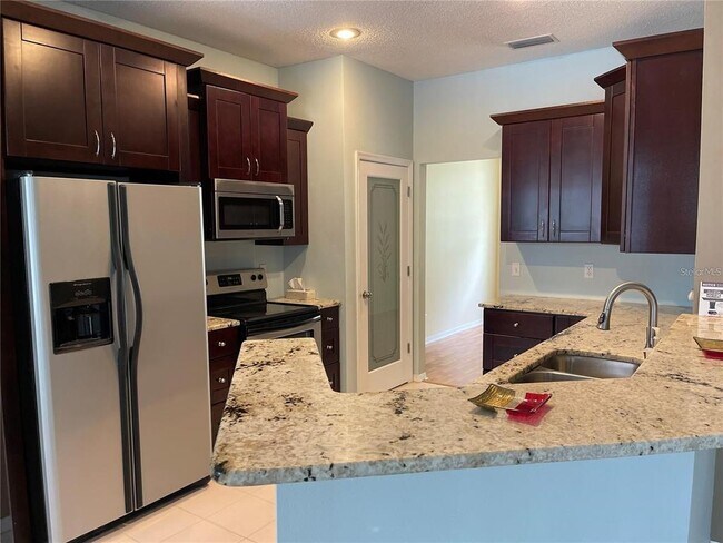 Foto del edificio - 4918 Willow Ridge Terrace