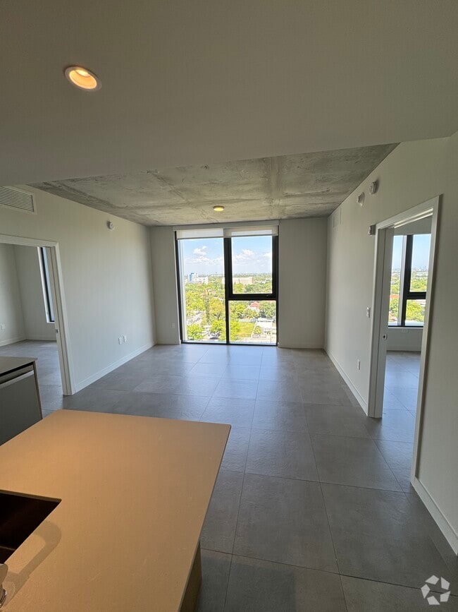 Living Room Floor to Ceiling Windows - 138 NW 31st St