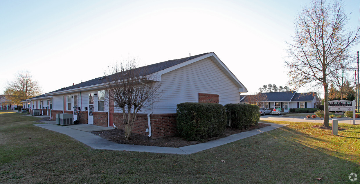 Building Photo - Four Oaks Village Apartments