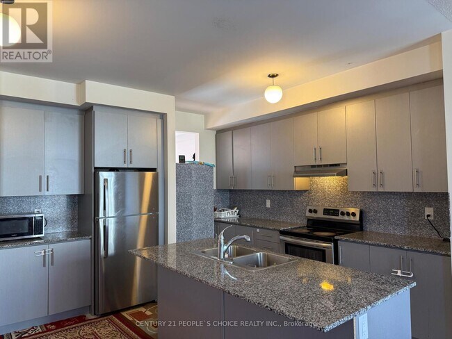 Photo du bâtiment - 22 Queenpost Dr