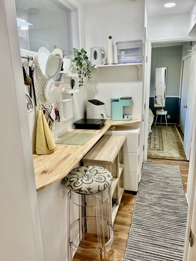 Kitchenette with small fridge/freezer, microwave, air fryer, infusion burner, Keurig Coffee Maker - 2236 River Run Dr