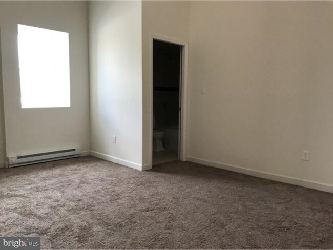 Foto del edificio - 310-312 W Main St