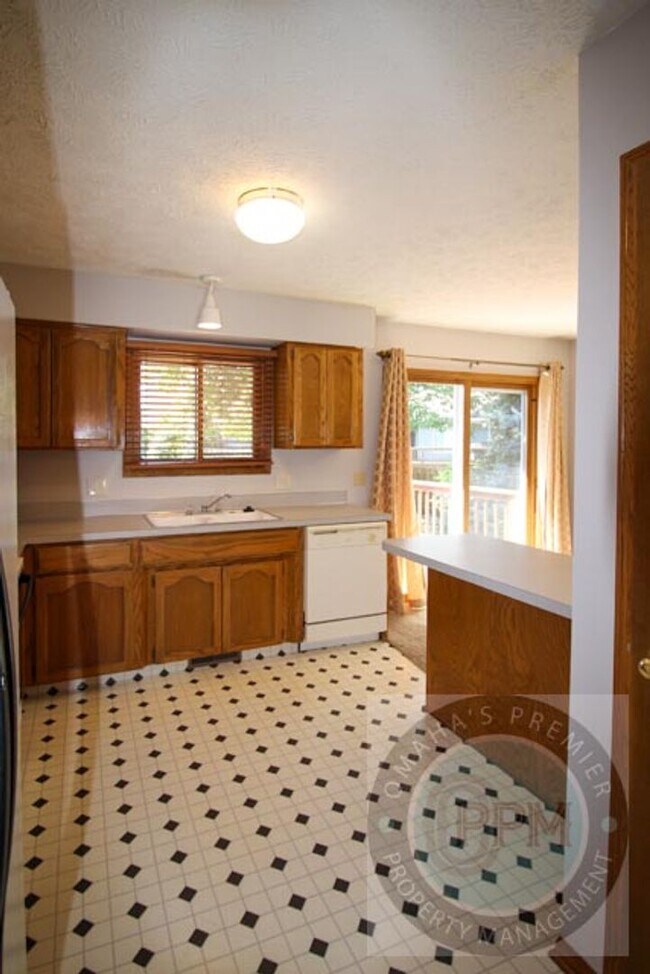 Building Photo - Cul-de-Sac Comfort! 3-Bed Omaha Home with ...