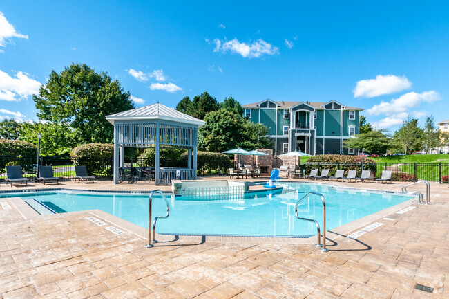 Sparkling Pool and Grill Area - The Pointe at State College