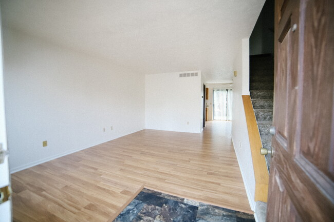 Living room - 1200 W Campus Dr
