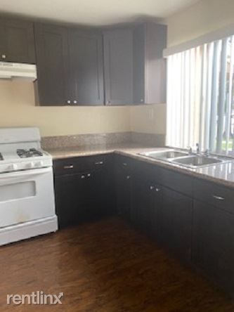 Building Photo - 2 br, 1 bath Townhome - 6970 Fulton St