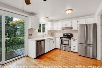 Building Photo - 29490 SW Courtside Dr