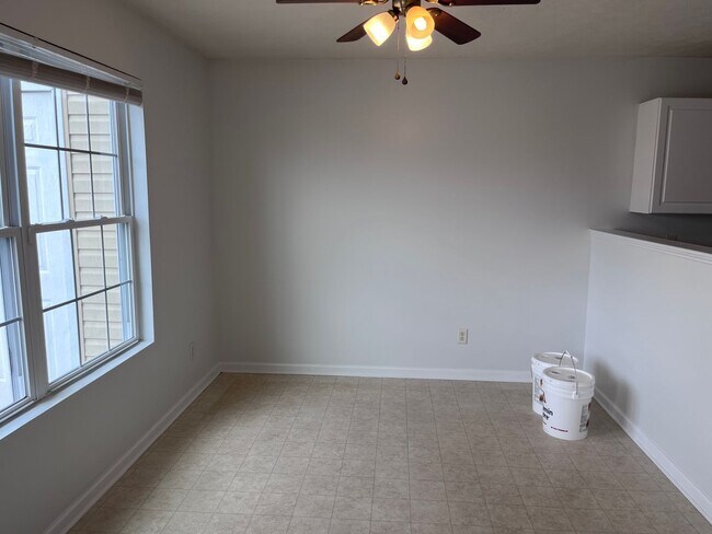 Building Photo - Freshly Painted and New Flooring!