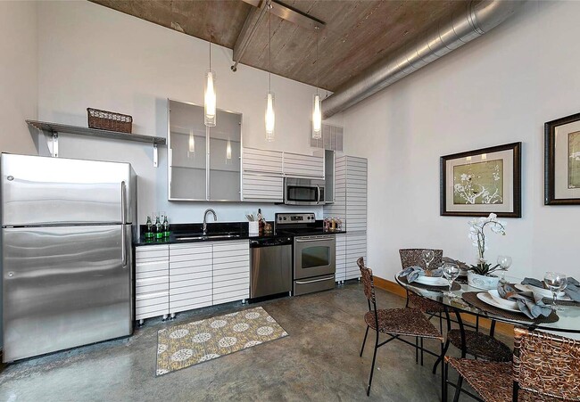 Kitchen with Brand New Cabinets and Granite Countertops - 411 N 22nd St