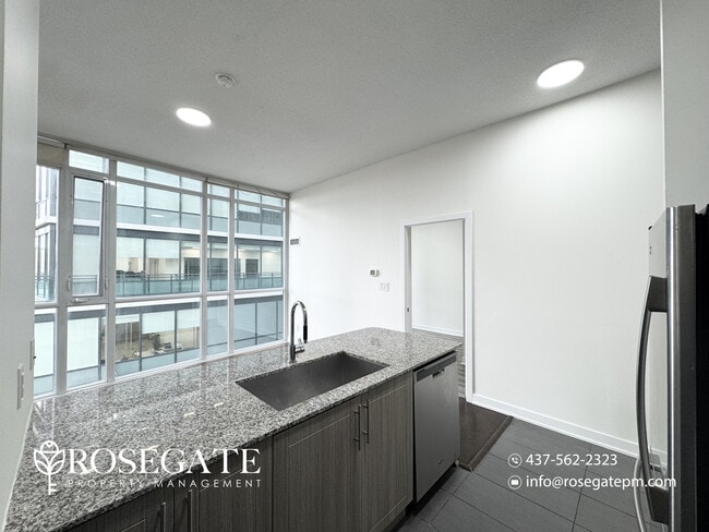 Building Photo - Modern 2-Bedroom Corner Condo with Private...