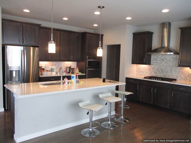 Building Photo - Spacious 4-Bedroom Home with Modern Comforts