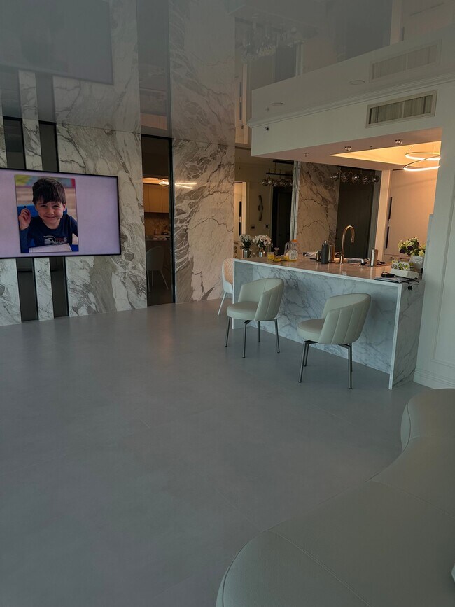 Building Photo - 16699 Collins Ave