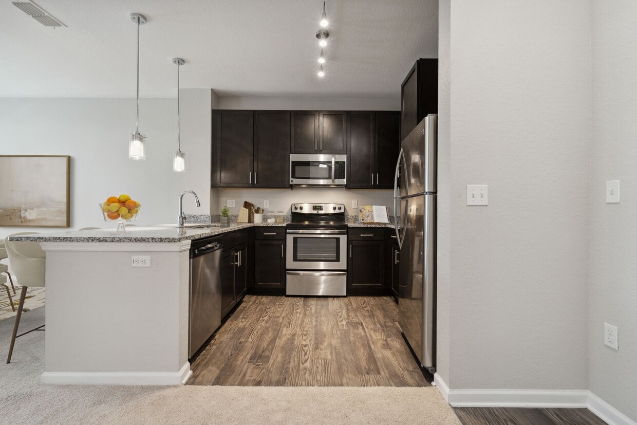 Kitchen with Stainless Steel Appliances - Village at Terra Bella