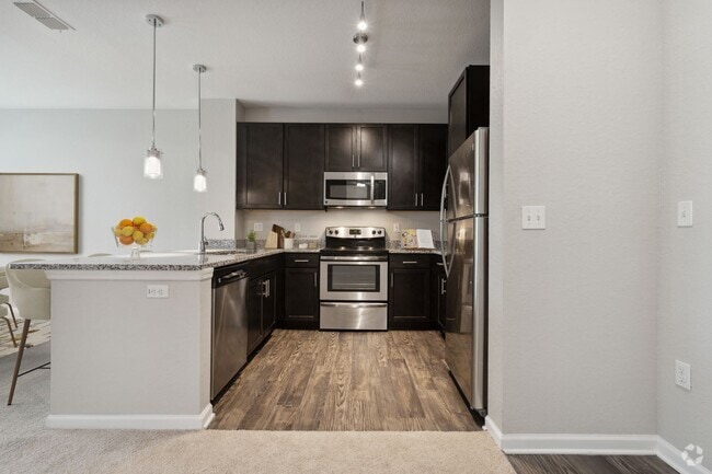 Kitchen with Stainless Steel Appliances - Village at Terra Bella