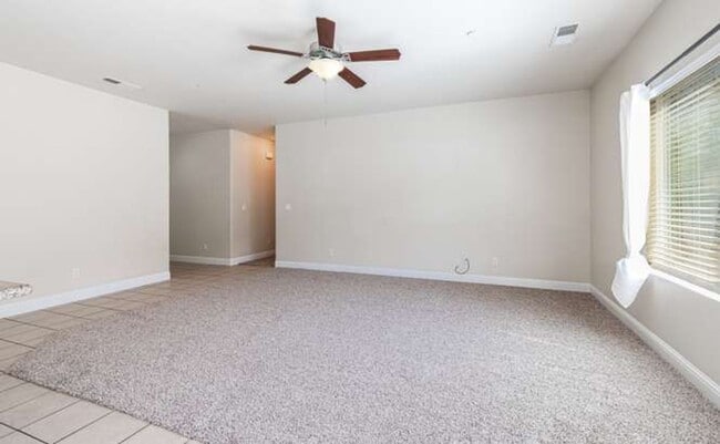 Building Photo - Four bedroom/2-bath home with 2-car garage