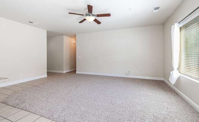 Foto del edificio - Four bedroom/2-bath home with 2-car garage