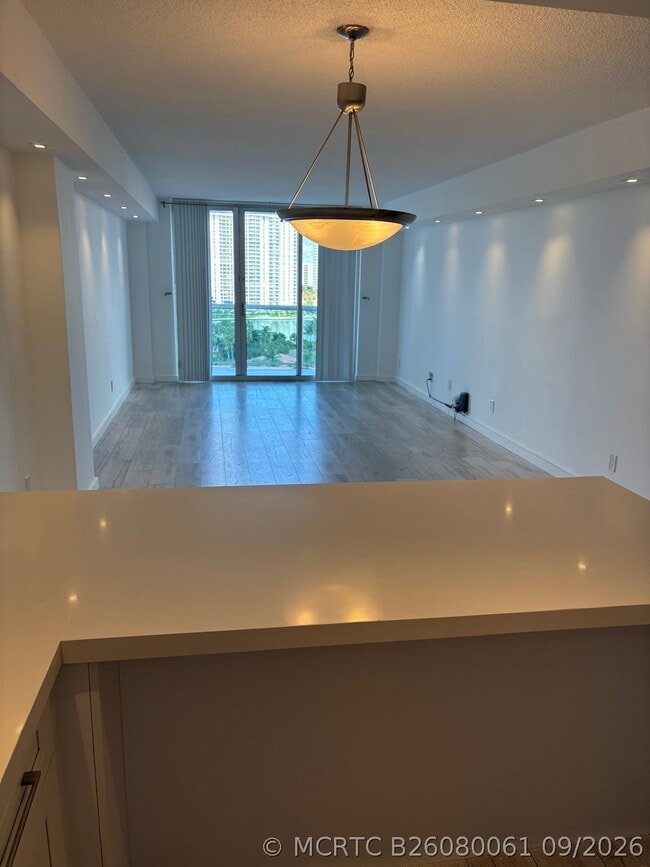 Building Photo - 19370 Collins Ave