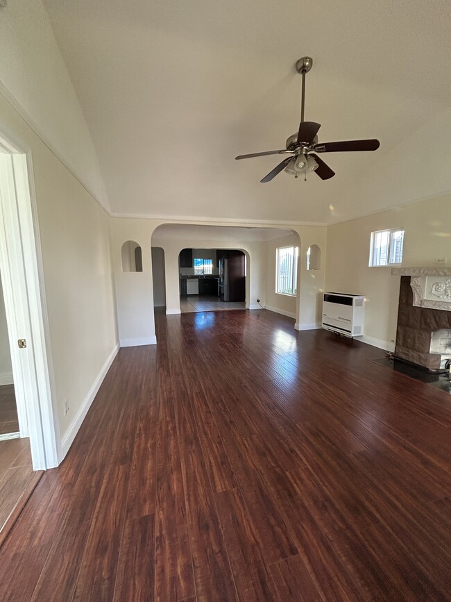 living room, dining room and kitchen open concept - 1655 W 65th Pl