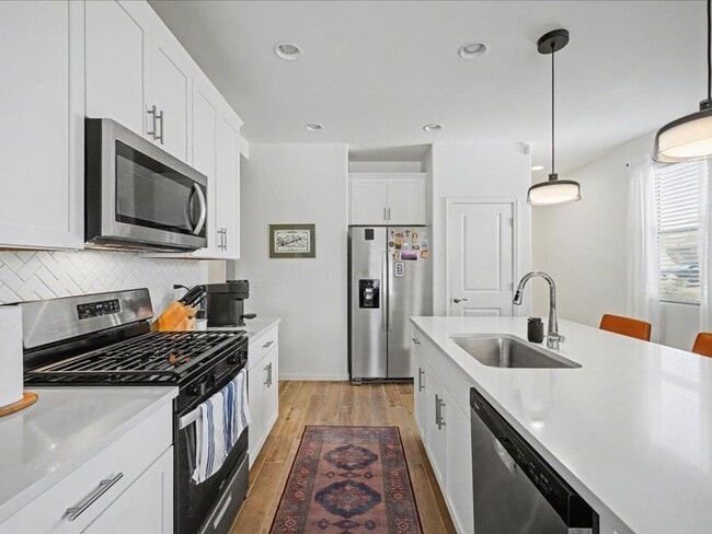 Building Photo - Spacious 4-Bedroom Home with Modern Features & EV Charging!
