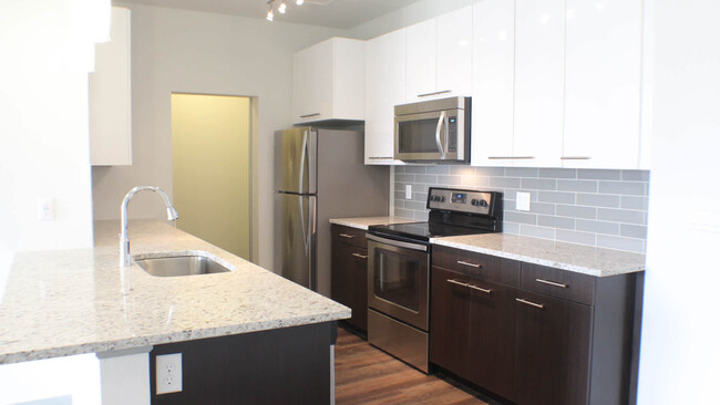 Kitchen with Stainless Steel Appliances - Milehouse