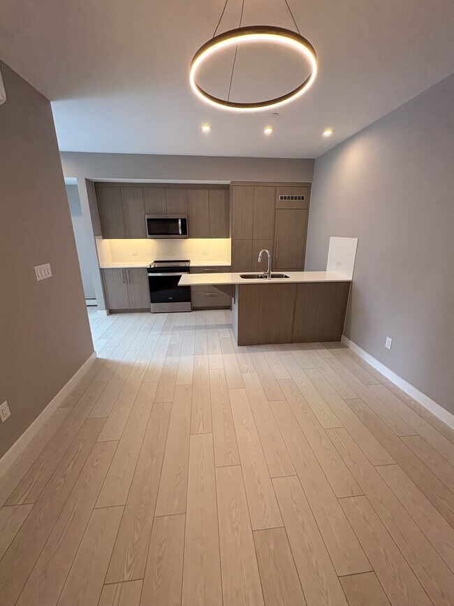 Photo du bâtiment - 310-215 15 Ave SW