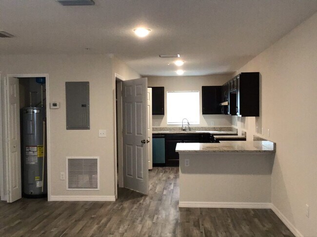 Building Photo - Available Now! Beautiful 2BR/2BA Quad for ...