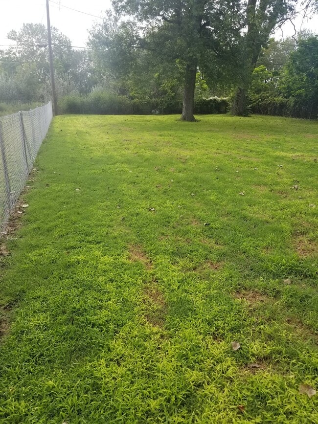 Building Photo - Backs to Open Space